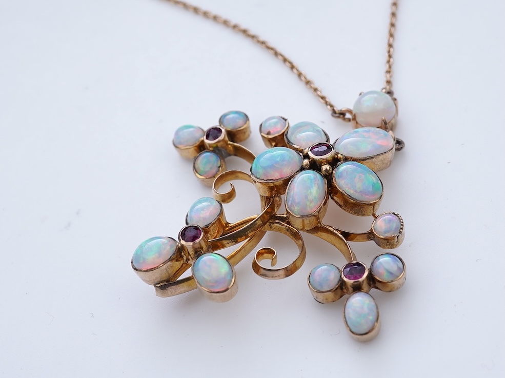 An opal and garnet pendant necklace, circa 1900